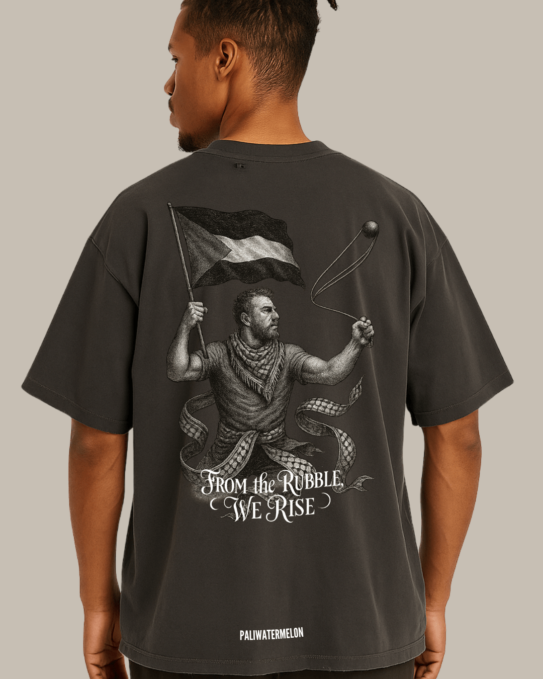 Model wearing Smoky Gray T-shirt showing detailed back illustration of uprising.